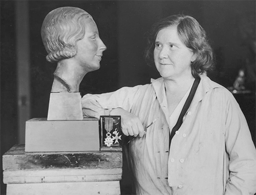 Anna Ladd with bust ("Gilberti," owned by Emile Mâle) and her decorations. Smithsonian Archives of American Art.