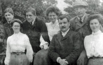 Mary E. Boyle arm in arm with her Brother David, surrounded by her siblings