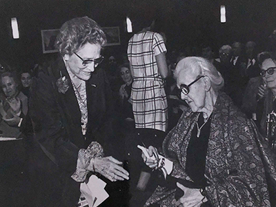 Leet honoring Nadia Boulanger on the occasion of her 90th birthday celebration at Reid Hall, 1978. Photograph retrieved from the RH archives.