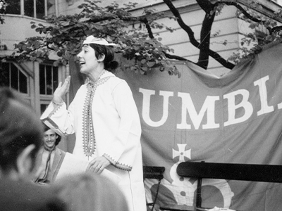 Danielle Haase-Dubosc leading a mock-graduation at Reid Hall. Photograph retrieved from the RH archives.