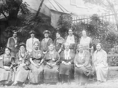 Leaders of the IFUW in Reid Hall's second garden, 1922; Gildersleeve is standing second from the left. Photograph retrieved from https://www.uwctoronto.ca/our-history.