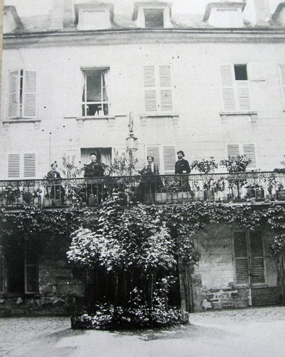 Keller with his wife, daughter, and son on the balcony overlooking the courtyard circa 1885 (Reid Hall archives)