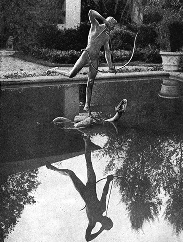Anna Ladd, "Sun God," bronze fountain figure, covered with dull gold, ca. 1911. Garden of Mrs. Scott Fitz, Manchester-by-the-Sea. See, The Work of Anna Coleman Ladd