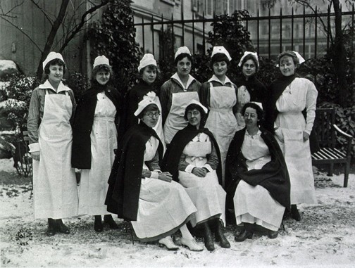 Group of nurses in the garden, photo A0111457, n.d., digital collections, National Library of Medicine.