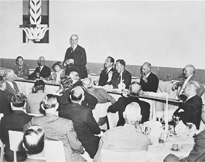 Photo by General Electric Company of Speakers' table in Terrace Club, at New York World's Fair Grounds; Helen Rogers Reid is only the woman in the picture. June 22, 1938. Museum of Innovation & Science. (Google Arts & Culture)