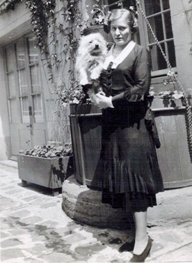 Dorothy F. Leet, photo with dog in the first courtyard, 1930s