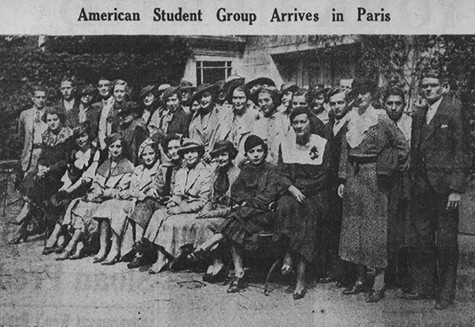 A group of 28 students, first of a contingent of 53, heading for the Tourraine Institute in Tours, France, posing in Reid Hall's first courtyard. Photograph retrieved from the New York Herald Tribune, September 4,1934, n.p. RH archives, scrapbook.