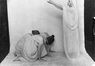 Barnard College Greek Games in 1914-15. Members of Class of 1917: Dorothy Leet (standing), Freda Wobber Marden, and Helen Leet. Photograph retrieved from Barnard digital collections.