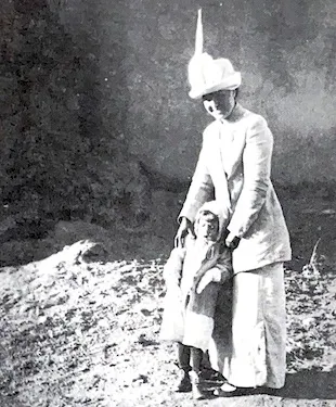 Mary Greene Blumenschein and Helen Greene Blumenschein Arriving in Taos, Ranchos Church in Background, 1913. Recuerdos: Early Days of the Blumenschein Family, by Helen Greene Blumenschein. Silver City, NM, Tecolote Press, 1979. 