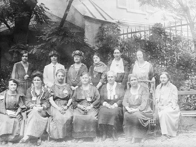 Leaders of the IFUW in Reid Hall's second garden, 1922; Gildersleeve is standing second from the left. Photograph retrieved from https://www.uwctoronto.ca/our-history.