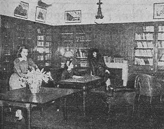 Reid Hall's Library, 1947. The students are: Sarah Frantz, Princeton; Alida M. Butler, St. Paul, Minnesota; Frances Huntoon, Providence, R.I. Photograph retrieved from New York Herald Tribune, February 15, 1948, n.p. RH archives, scrapbook.