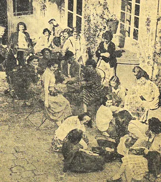 Group of Smith students in Reid Hall's first courtyard, 1948. Photograph retrieved from the New York Herald Tribune, Paris, September 28, 1948, n.p. Retrieved from RH archives, scrapbook.