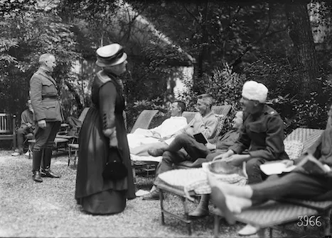 Mrs. Whitelaw Reid & Colonel Gibson A.R.C. commissioner for France visiting wounded American officers in the garden (August, 1918), American National Red Cross Photograph Collection